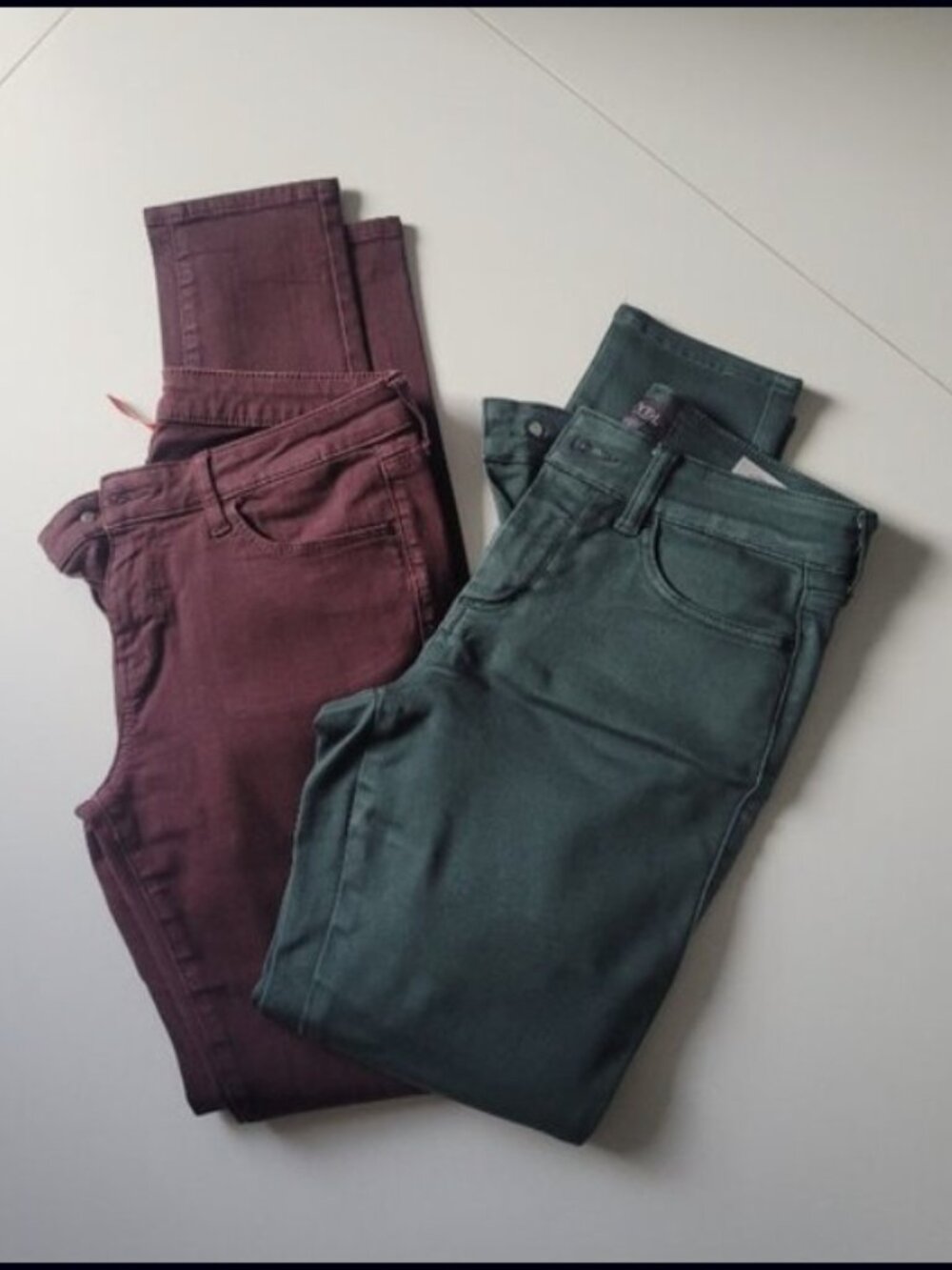 two pairs of skinny jeans